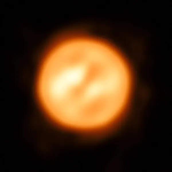 A reconstructed image of the red supergiant Antares showing a mottled disc